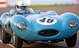  ??  ?? Classic car racer: Clive Joy-Morancho in a 1955 Jaguar D-type