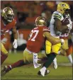  ?? NHAT V. MEYER — BANG, FILE ?? The 49ers’ Nick Bosa (97) tackles the Packers’ Aaron Jones in the first quarter of their 2019 game at Levi’s Stadium in Santa Clara.