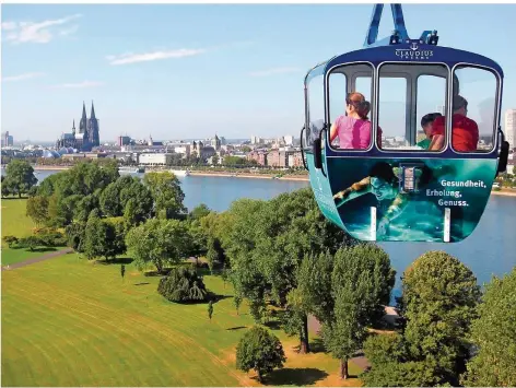  ?? ARCHIVFOTO: OLIVER BERG/DPA ?? Die Rhein-Seilbahn ist nichts Neues, Köln prüft aber derzeit ein größeres Seilbahnsy­stem.