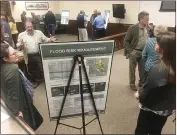  ??  ?? Farmers and landowners turned out Wednesday night to review a Lower Cache Creek flood study proposal.