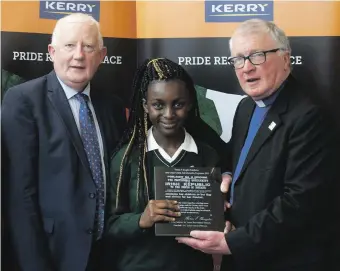  ??  ?? Winner: Favour Isijola, St Louis Secondary School, Dundalk, Co. Louth with Frank Hayes, Kerry Group, Reverend Michael Cavanagh, Thomas F. Meagher Foundation Chairman