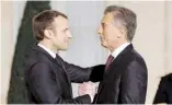  ??  ?? Frente a frente. Macron y Macri.