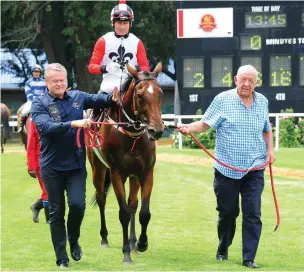  ?? Picture: JC Photograph­ics. ?? FIRST WIN. Laurence Wernars and Roland Bouwer celebrate after Nautic Spirit wins a 1200m sprint at the Vaal yesterday.