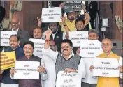  ?? PTI ?? TDP lawmakers stage a protest outside the Parliament on Tuesday demanding a special package for Andhra Pradesh.