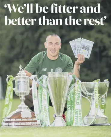  ??  ?? 0 Scott Brown launches a DVD commemorat­ing Celtic’s unpreceden­ted double treble success.