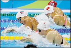  ??  ?? Russia’s Yulia Efimova leads the field in the women’s 4 x 100-meter medley relay final during the swimming competitio­ns at the 2016 Summer Olympics, on
Aug 13, i Rio de Jeneiro, Brazil. (AP)