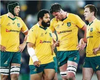  ??  ?? Dejected: Wallaby forwards show their hurt