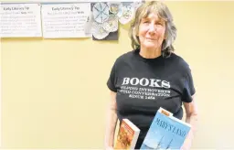  ?? REBECCA PLACEK ?? Lucia St. Clair Robson with her books “Ride The Wind” and “Mary’s Land.”