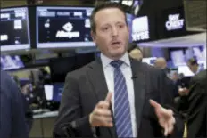  ?? RICHARD DREW — THE ASSOCIATED PRESS ?? Allergan CEO Brent Saunders is interviewe­d on the floor of the New York Stock Exchange, Wednesday. The biggest U.S.-based drugmaker, Pfizer Inc., will stay put thanks to aggressive new Treasury Department rules that succeeded in blocking Pfizer from...