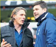  ??  ?? CUP MAGIC Ainsworth with then Spurs boss Pochettino