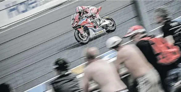  ?? DAVID REYGONDEAU/HONDA ?? Team Honda at the 2018 24 Heures Motos at Le Mans, France. Similar to the famous car race held on the track, the motorcycle race is a test of endurance.