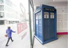  ??  ?? The TARDIS, from the popular British TV show Doctor Who, is on display at a pop-up shop in College Park in downtown Toronto.