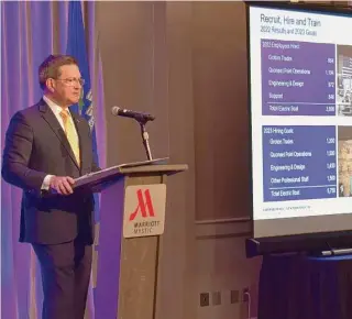  ?? Alexander Soule/Hearst Connecticu­t Media ?? Kevin Graney, president of General Dynamics subsidiary Electric Boat, speaks in Groton on Monday. The company hired nearly 4,000 people last year.