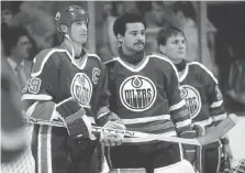  ?? STEVE BABINEAU/NHLI VIA GETTY IMAGES/FILES ?? When Wayne Gretzky played alongside Grant Fuhr and Andy Moog with the Edmonton Oilers during the 1980s, the game was played far differentl­y in the NHL than in the years that preceded their time — and in the years that followed.