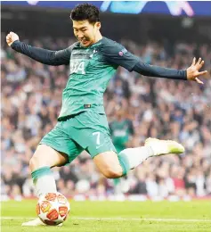  ??  ?? Tottenham Hotspur’s striker Son Heung-Min takes a shot at goal during the UEFA Champions League quarter final second leg match against Manchester City at the Etihad Stadium in Manchester, north west England. — AFP photo