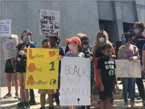  ?? CARL HESSLER JR. — MEDIANEWS GROUP ?? Protesters, many carrying signs, attended a rally to denounce comments Montgomery County Commission­er Joseph C. Gale made about the Black Lives Matter movement and called for his resignatio­n.