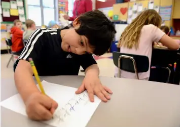 Cursive writing is looping back into style in these schools - PressReader