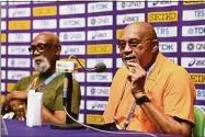  ?? Hannah Peters / Getty Images for World Athletics ?? John Carlos and Tommie Smith speak at a press conference at the World Athletics Championsh­ips in Eugene, Oregon.