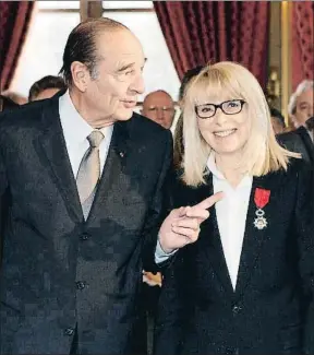  ?? PATRICK KOVARIK / AFP ?? El presidente Chirac otorgó a Darc en el 2006 la Legión de Honor