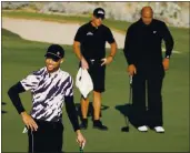  ?? CHRISTIAN PETERSEN — GETTY IMAGES ?? Stephen Curry reacts to a missed putt as Phil Mickelson and Charles Barkley look on during the Champions For Change match in November.