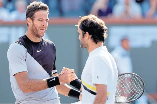  ?? Matthew StockMan / aFP ?? Del Potro saluda a Federer luego de ganarle la final del Masters 1000 de Indian wells en marzo