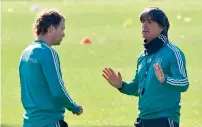  ?? AFP ?? Joachim Loew (right) and Germany’s assistant coach Marcus Sorg attend a training session. —