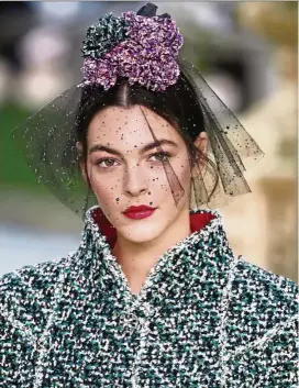  ??  ?? A red lip at Chanel.
