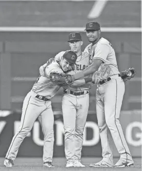 ?? BRAD REMPEL/USA TODAY SPORTS ?? Guardians outfielder­s, from left, Steven Kwan (age 24), Myles Straw (27) and Oscar Gonzalez (24) illustrate the youth of the team.
