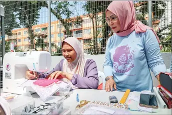  ?? ?? Bidadari Malaysia’s fabric sanitary pad sewing initiative has so far benefited 1,000 women in Kuala Lumpur, Kelantan, Terengganu and Pahang.