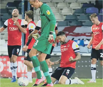  ?? ?? Luton Town celebrate their Great Escape on the final day of the 2019-20 Championsh­ip season. Photo: Liam Smith