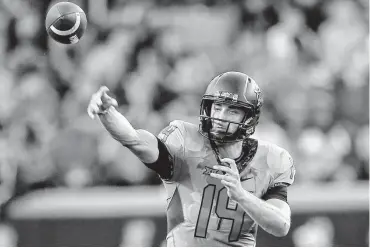  ?? [PHOTO BY SARAH PHIPPS, THE OKLAHOMAN] ?? Oklahoma State quarterbac­k Taylor Cornelius is 3-for-19 on passes of at least 30 yards downfield this season, per a film review of the Cowboys’ first four games.