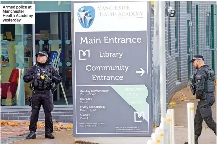  ?? ?? Armed police at Manchester Health Academy yesterday