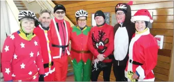  ??  ?? Violet McDermott,Alan Kelly, Con Lee, Alo Farragher, Padraig Hackett, James Watters and Anne Osborne at the Innisfree Wheelers Santa Cycle which raises money for the Lions Club.