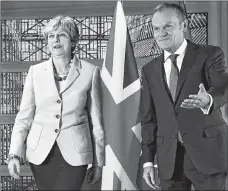  ?? AP PHOTO ?? British Prime Minister Theresa May, left, walks with European Council President Donald Tusk in Brussels.