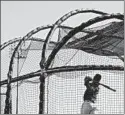  ?? CHARLIE RIEDEL/AP ?? The Royals’ Salvador Perez hits during a spring training workout Wednesday.