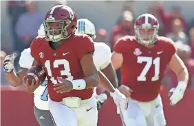  ?? MARVIN GENTRY/USA TODAY SPORTS ?? Quarterbac­k Tua Tagovailoa accounted for four touchdowns Saturday for Alabama, including one rushing.