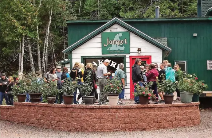  ??  ?? Prior to COVID-19, tourists lined up outside Jampot to buy jams and baked goods. Today, masks are required to enter the store or folks
an buy goods at poorrockab­bey.com.