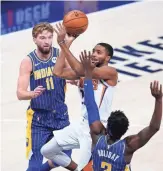  ?? AP ?? The Suns’ Mikal Bridges (25) shoots against the Indiana Pacers’ Aaron Holiday (3) Saturday in Indianapol­is.