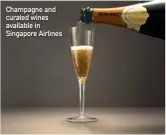  ??  ?? Champagne and curated wines available in Singapore Airlines