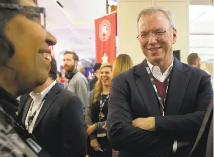  ?? Stephen Crowley / New York Times 2016 ?? Eric Schmidt (right), Alphabet’s chairman, and his wife are funding the new fellowship for interdisci­plinary research.