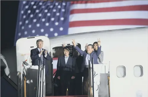  ?? PICTURE: AP PHOTO. ?? BACK HOME: President Donald Trump greets former detainees Tony Kim, Kim Hak Song (in shadow), and Kim Dong Chul, with Melania Trump, as they arrive in the US.