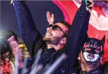  ?? AFP ?? People dance at the electronic music festival ‘Les Dunes Electroniq­ues’ at Ong Jmel, near the town of Nefta in western Tunisia, on Saturday.