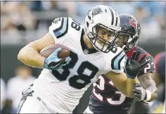  ?? JASON E. MICZEK — THE ASSOCIATED PRESS ?? Pro Bowl tight end Greg Olsen (88) of the Panthers will miss at least eight games after being put on IR with a broken foot suffered Sunday against the Bills.