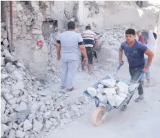  ?? — AFP ?? Reconstruc­tion makes slow start with Russia’s help in Syrian city which was devastated by civil war.