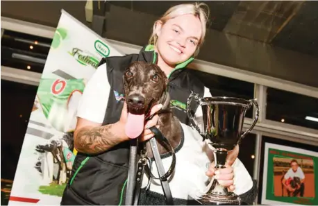  ?? ?? Robbie Rotten with trainer Kayla Cottrell and the prized Warragul Cup.