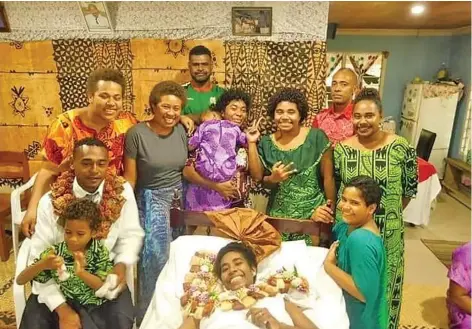  ??  ?? The newly-wedded couple with family members at their home in Nasekula on May 22, 2020.