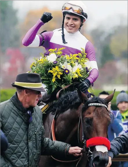  ?? — GETTY IMAGES FILES ?? Mario Gutierrez celebrates after winning the Breeders’ Cup Juvenile atop Nyquist during the Breeders’ Cup last fall. Nyquist is the favourite going into this year’s Kentucky Derby.