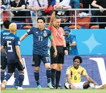  ?? FILIPPO MONTEFORTE/AFP/GETTY IMAGES ?? Referee Damir Skomina shows Colombia’s Carlos Sanchez a red card for a handball committed Tuesday.