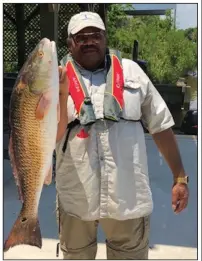  ?? Photo submitted by Bruce Murphy ?? Joe Hargrove caught this big red drum recently on Lake Calcasieu in Louisiana.