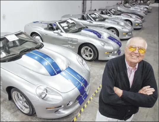  ?? K.M. Cannon Las Vegas Review-Journal file ?? Automotive legend Carroll Shelby shows off Series 1 sports cars fresh off the assembly line at his Las Vegas plant in 2000.